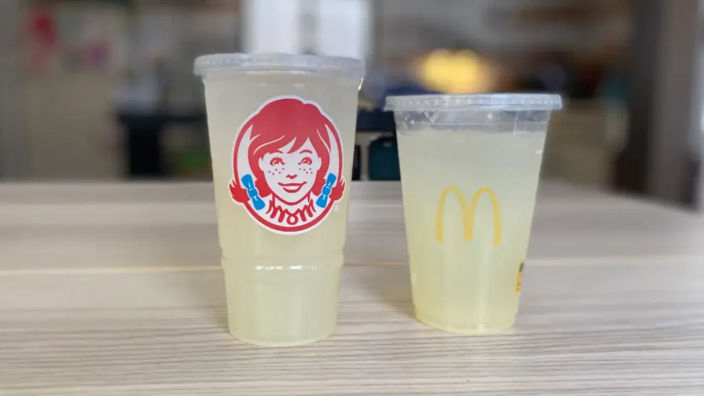 Wendy’s-style branded cup filled with pale yellow Minute Maid Lemonade
