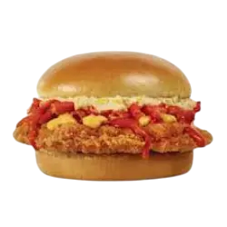 A breakfast sandwich served with crispy seasoned potatoes and a steaming cup of coffee