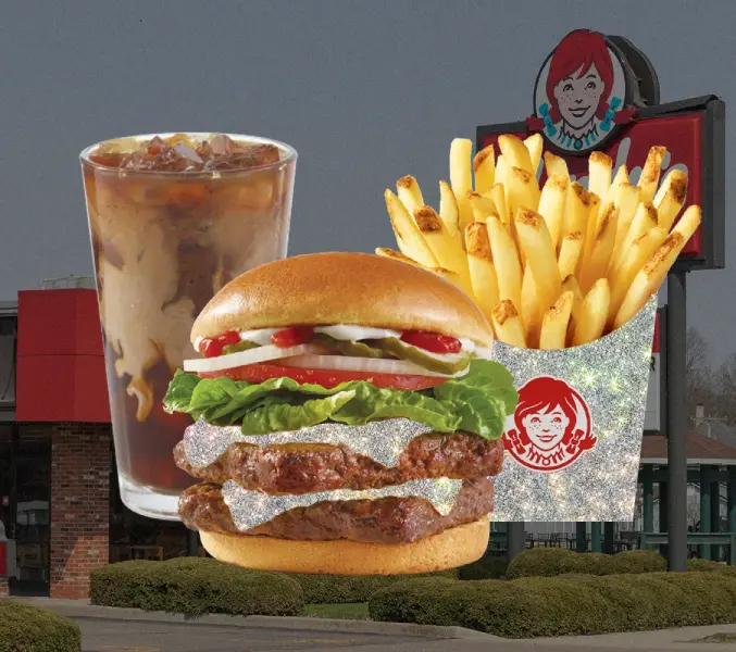 Close-up of Wendy’s Frosty Fusion dessert, with Oreo brownie chunks and caramel drizzle over vanilla Frosty